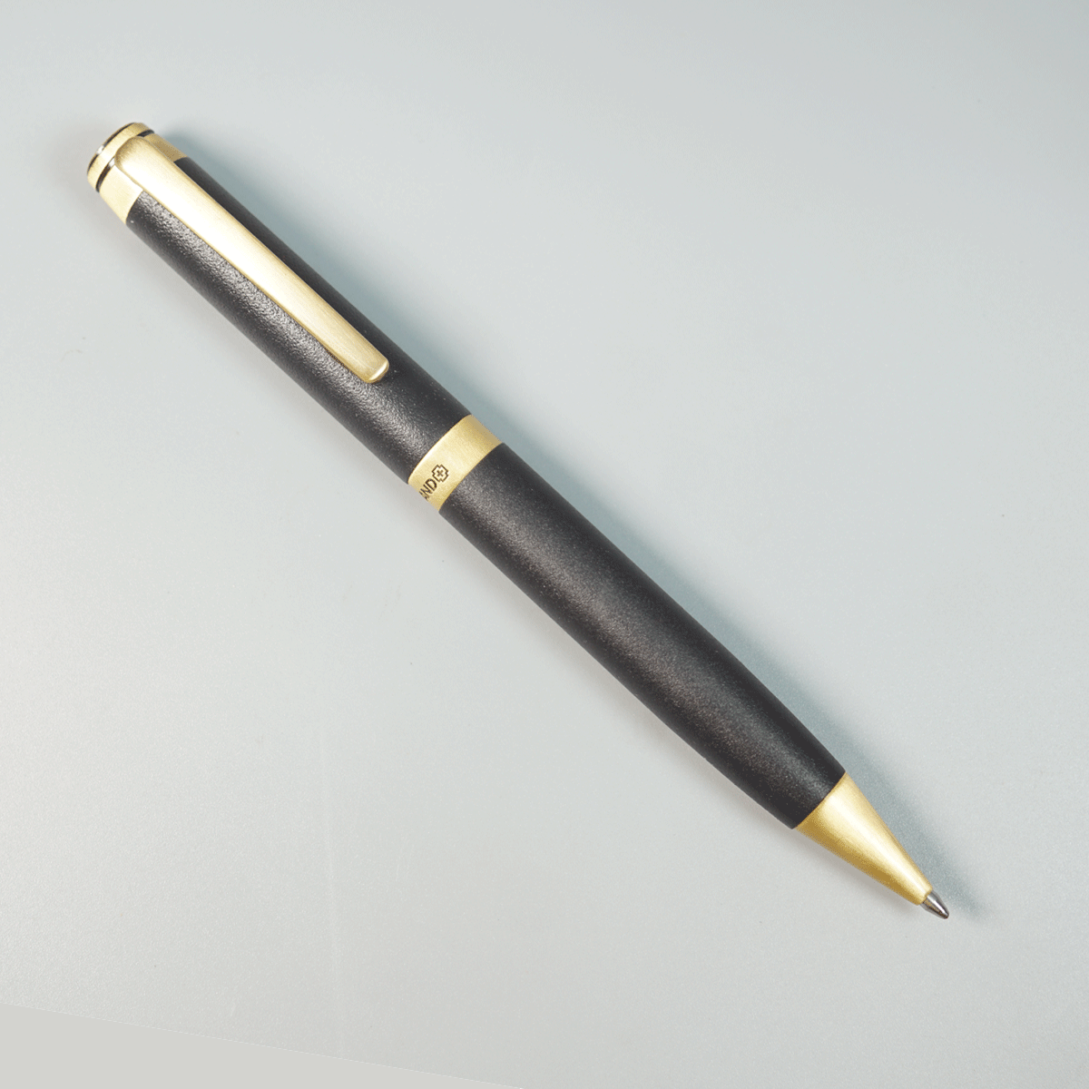 Swiss Brand 2501 Matte Black Color Body And Gold Color Trim And Clip Medium Tip Twist Type Ball Pen SKU 29029
