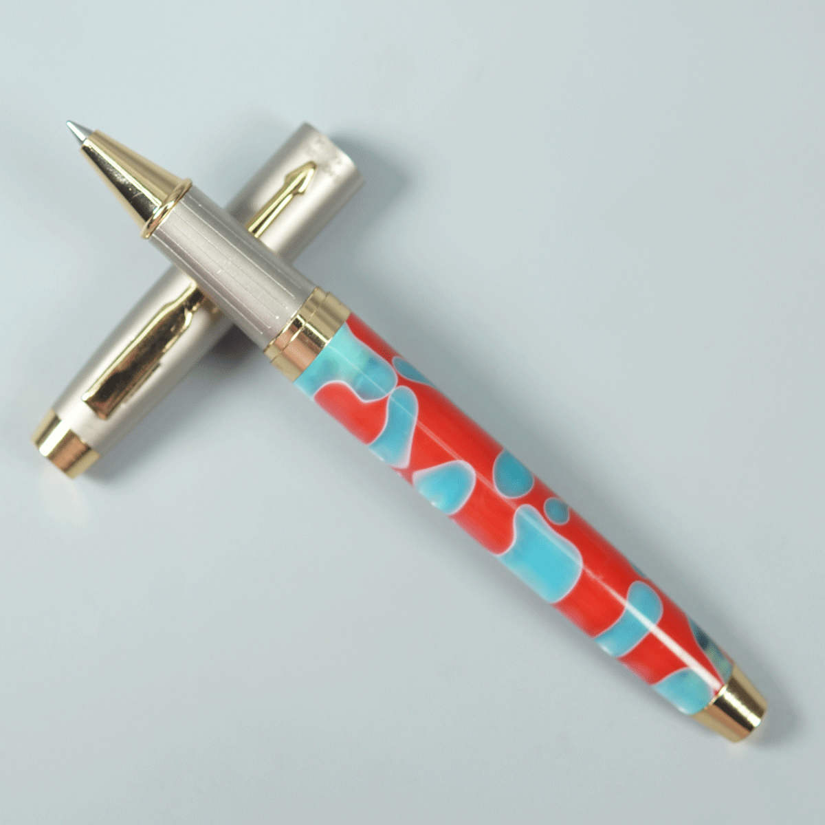 Sigaura Red With Blue Color Marble Designed With Cream Color Cap Roller Ball Pen SKU 29060