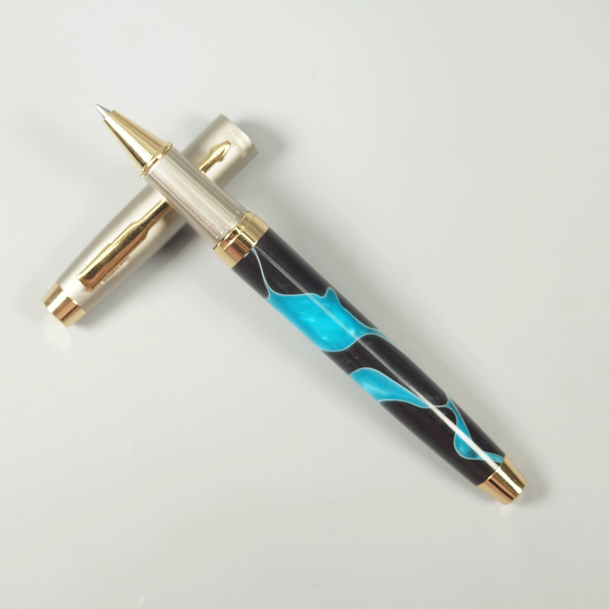 Sigaura Black With Blue Color  Marble Designed Body And Cream Color Cap  Roller Ball Pen SKU 29062