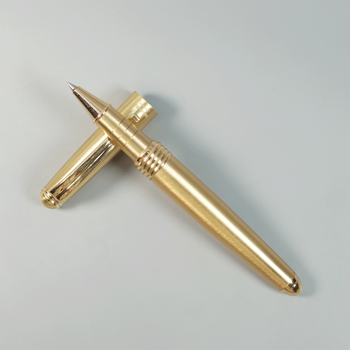 Sigaura Steller Full Gold Color Body With Gold Trim Fine Tip Roller Ball Pen SKU 29066