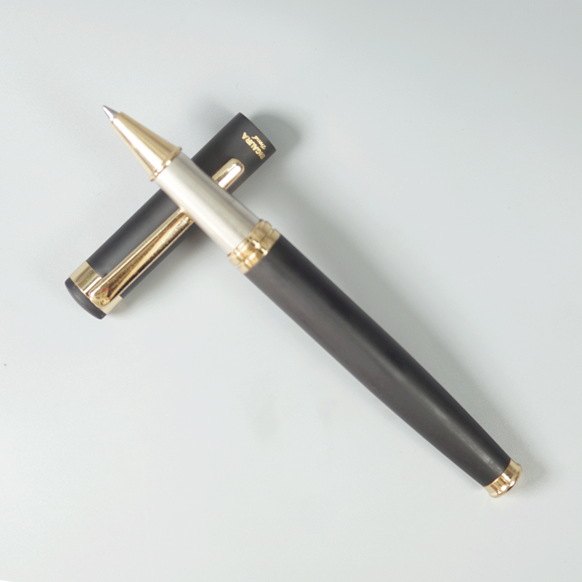 Sigaura Trend Matte Black Color Body With Gold Color Clip And Cap Type Roller Ball Pen SKU 29068