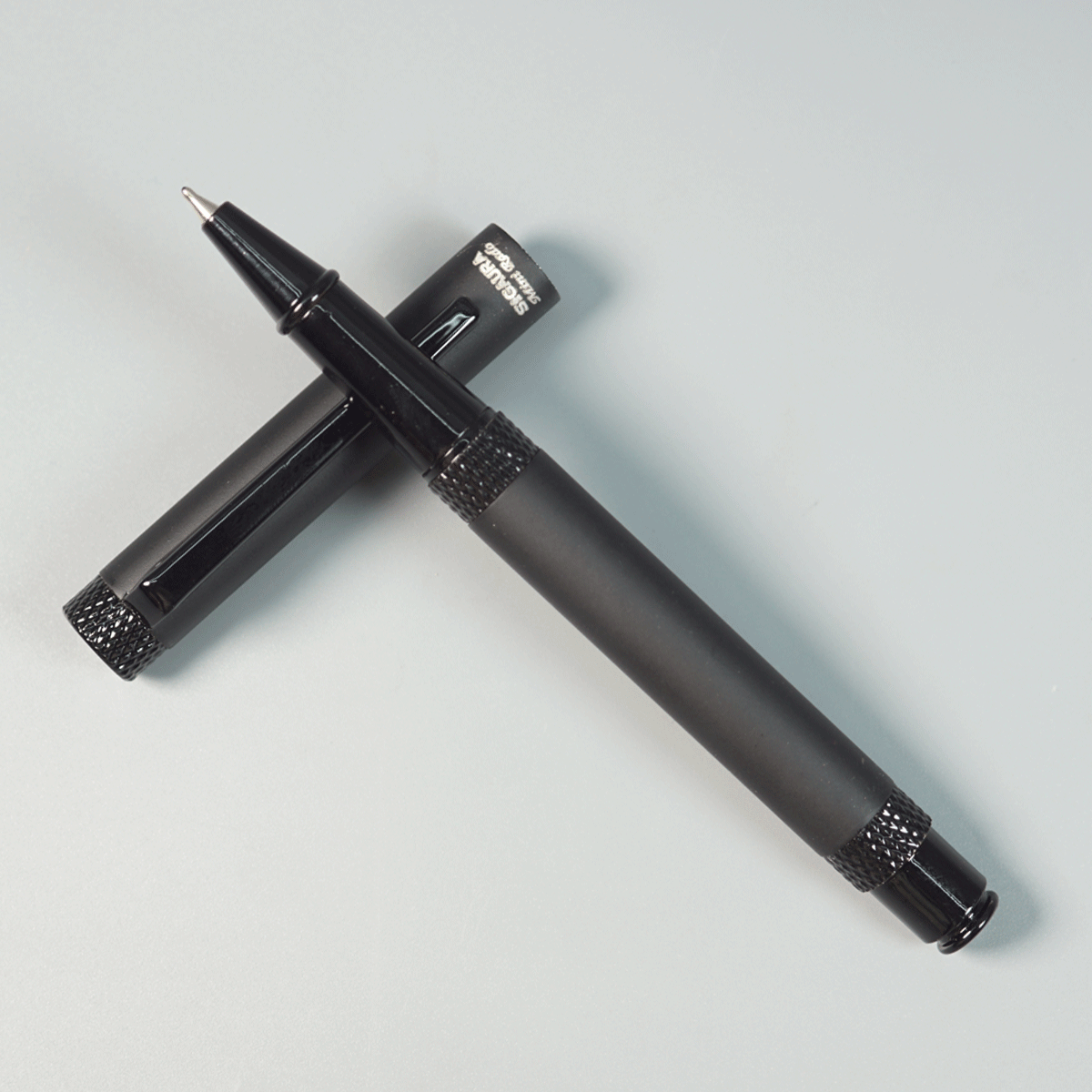 Sigaura Mini Rado Black Color Body With Black Clip Fine Cap Type Ball Pen SKU 29074