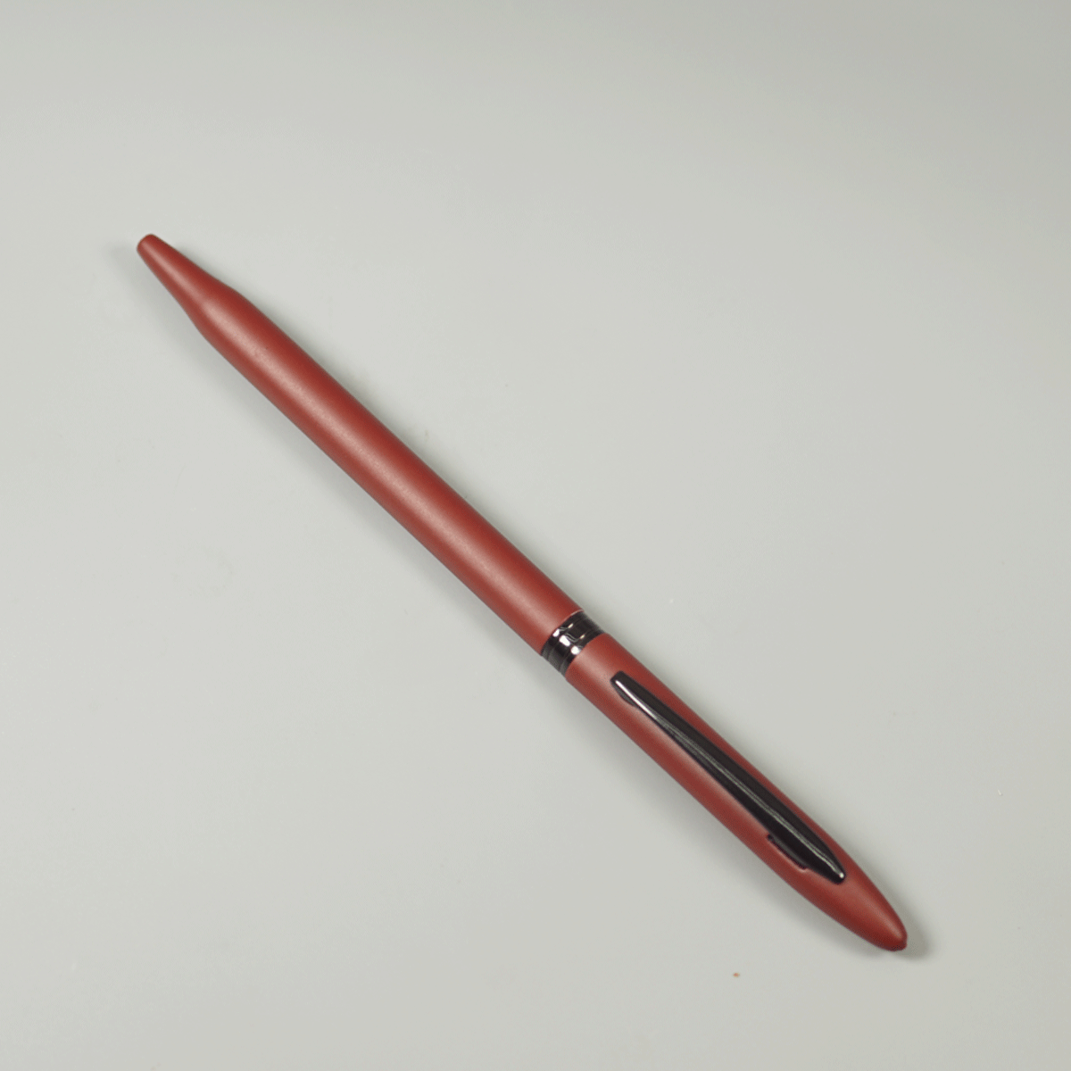penhouse.in pens Red Color Body With Black Clip And Trim Fine Tip Twist Type Ball Pen SKU 29087