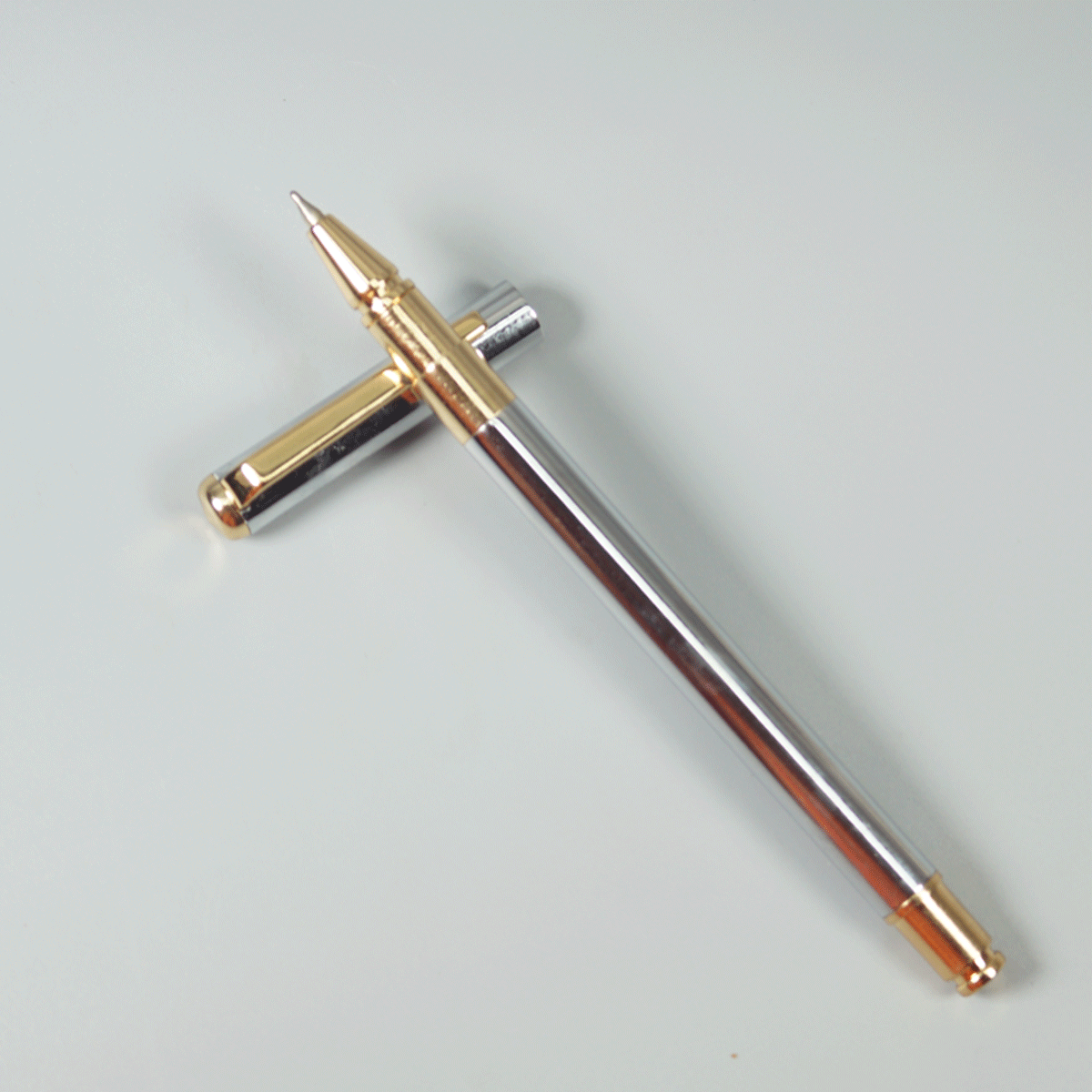 penhouse.in pens Silver Color Body With Gold Clip And Trim Fine Tip Cap Type Ball Pen  SKU 29090