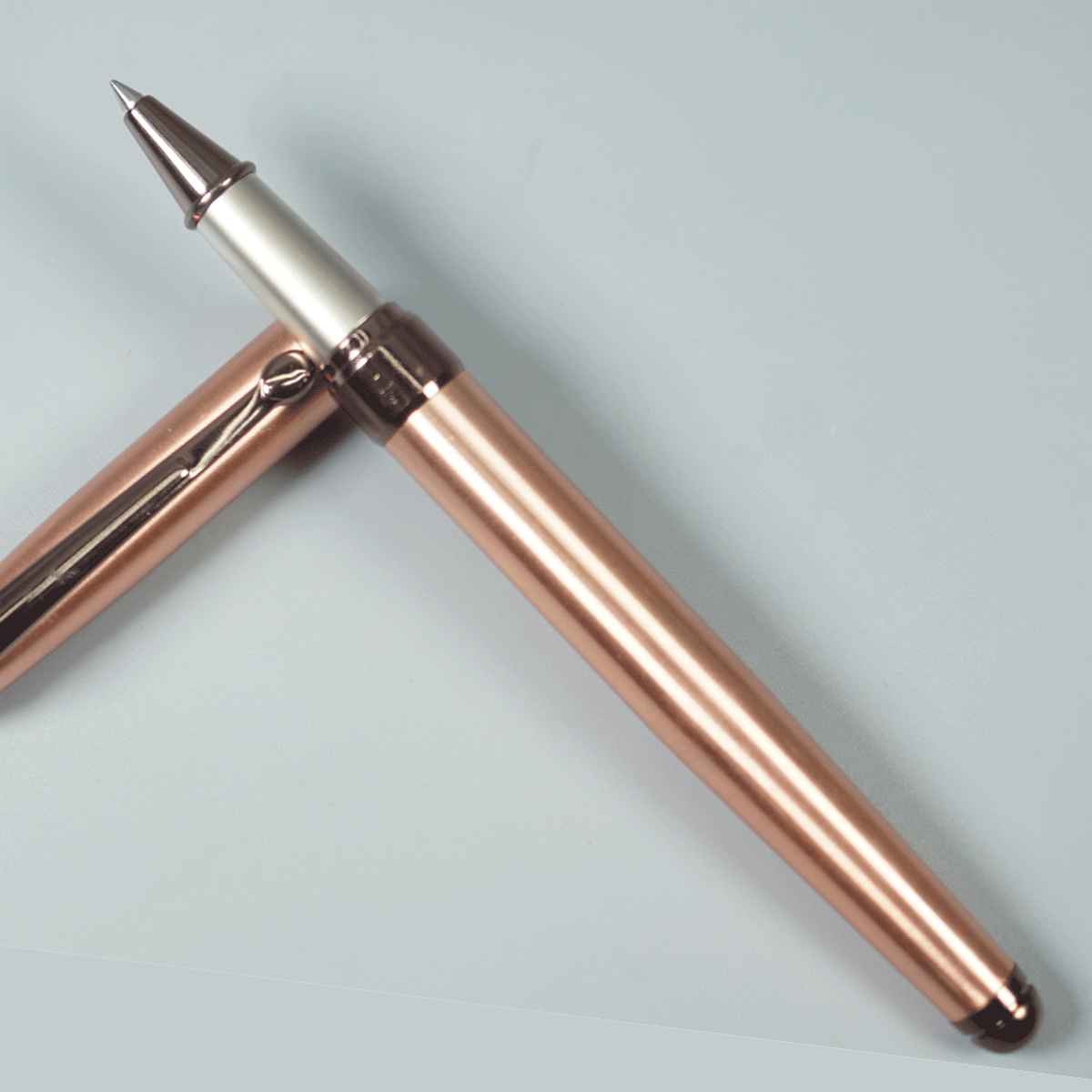 Sigaura Comet Glossy Body Full  Rose Gold Color With Brown Color Clip  And Trim Fine Tip Type Roller  Ball Pen SKU 29115