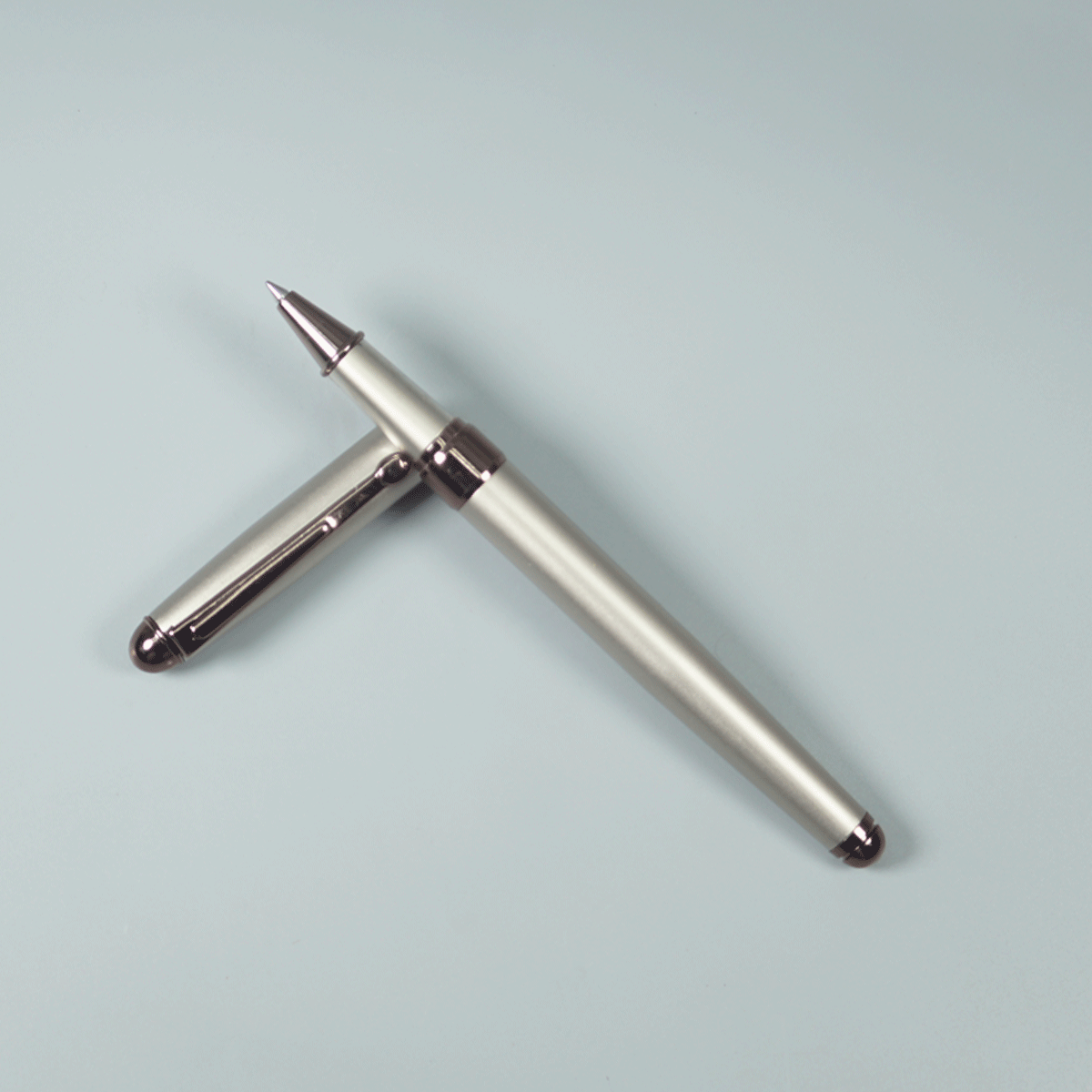 Sigaura Comet Glossy Body Full Silver Color With Brown Color Clip And Trim Fine Tip Type Roller Boll PEN SKU 29117