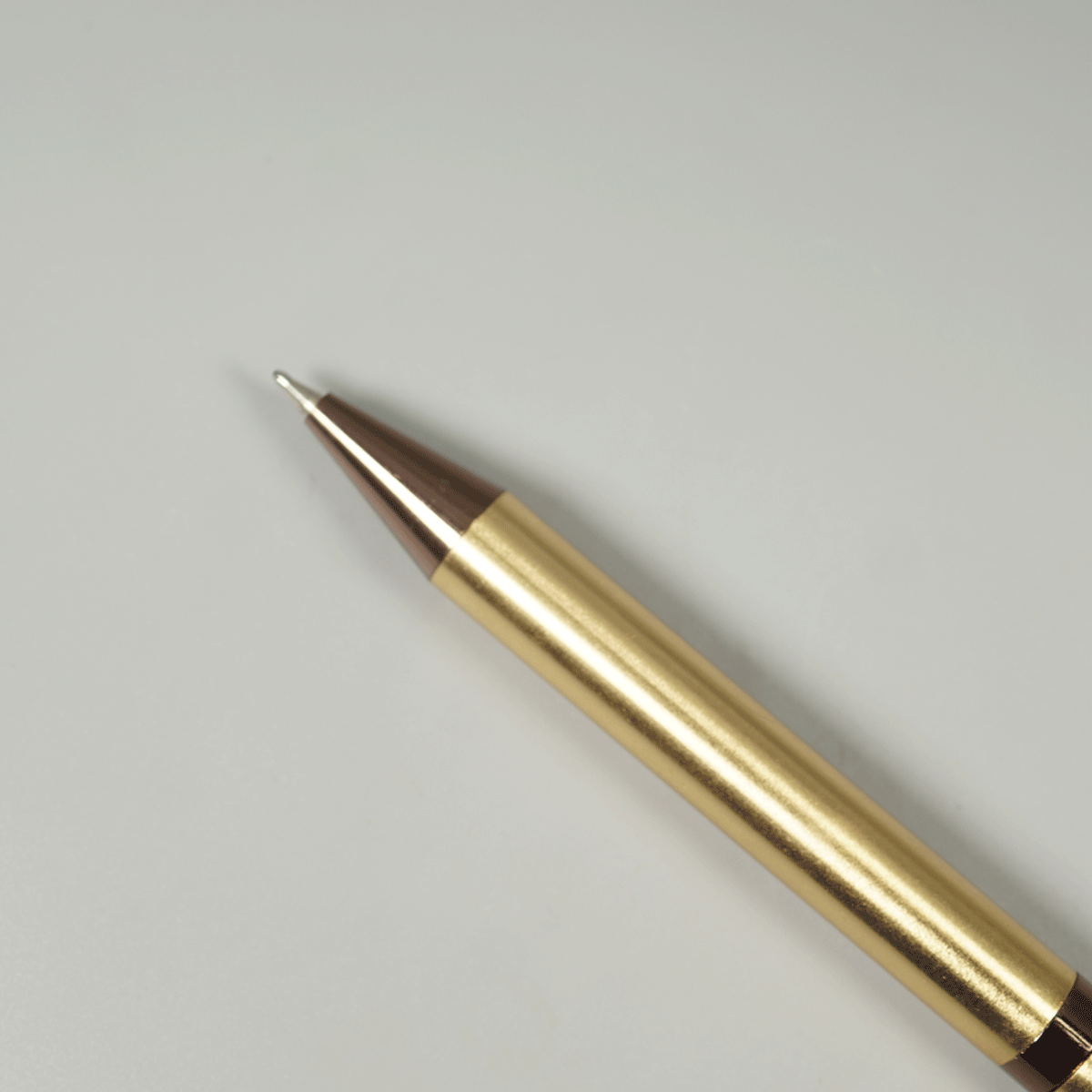 Sigaura Aster Glossy Body Full Gold Color With Brown Color Clip And Trim Fine Tip Twist Type Ball Pen SKU 29120
