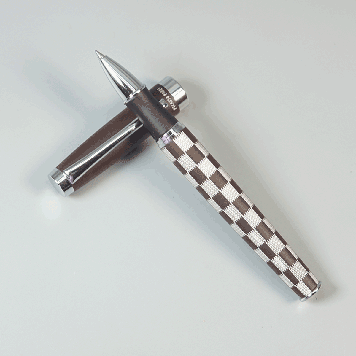 Picasso Parri Checkers Brown And White Color Body With Black Grip And Brown Cap With Silver Clip With Matte Type Roller Ball Pen SKU 29154