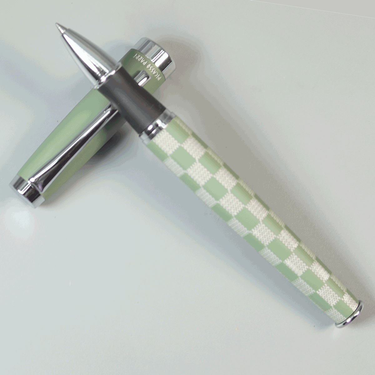 Picasso Parri Checkers Green And White Color Body With Black Grip And Green Cap With Silver Clip With Matte Type Roller Ball Pen SKU 29155