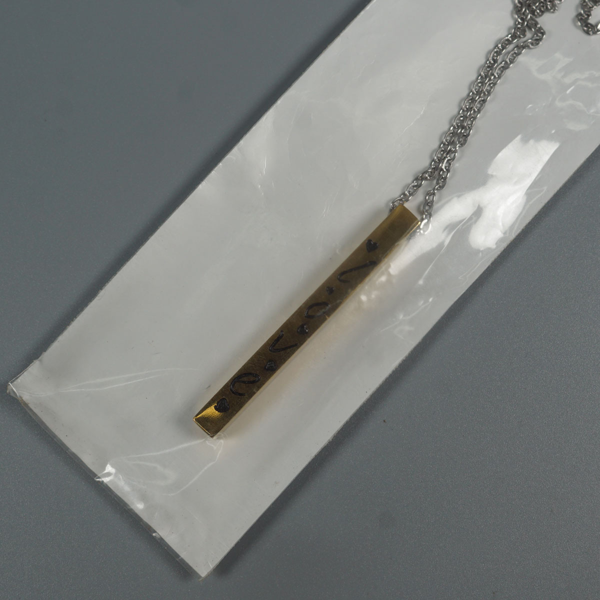 penhouse.in Gold Toned Rectangular Pendant And Silver Color Neck Chain  SKU 51926
