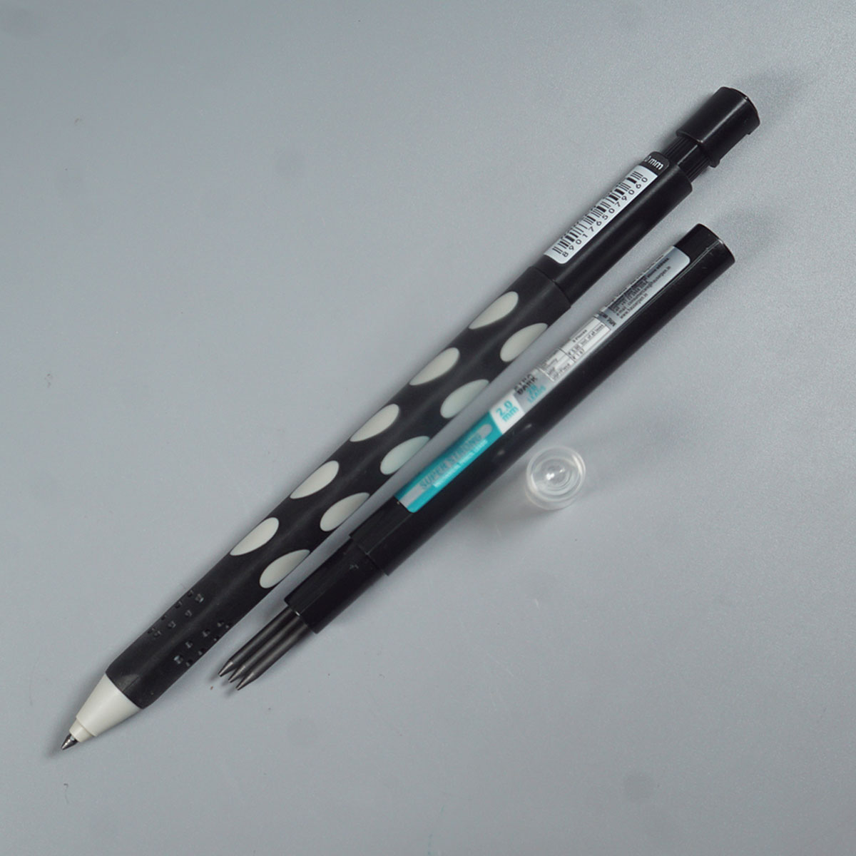 Hauser  One 2.0 mm Black Color Body With Dotted Designed Grip Patttern Built-in Sharpener ractactable Type Mechanical pencil  SKU 52218