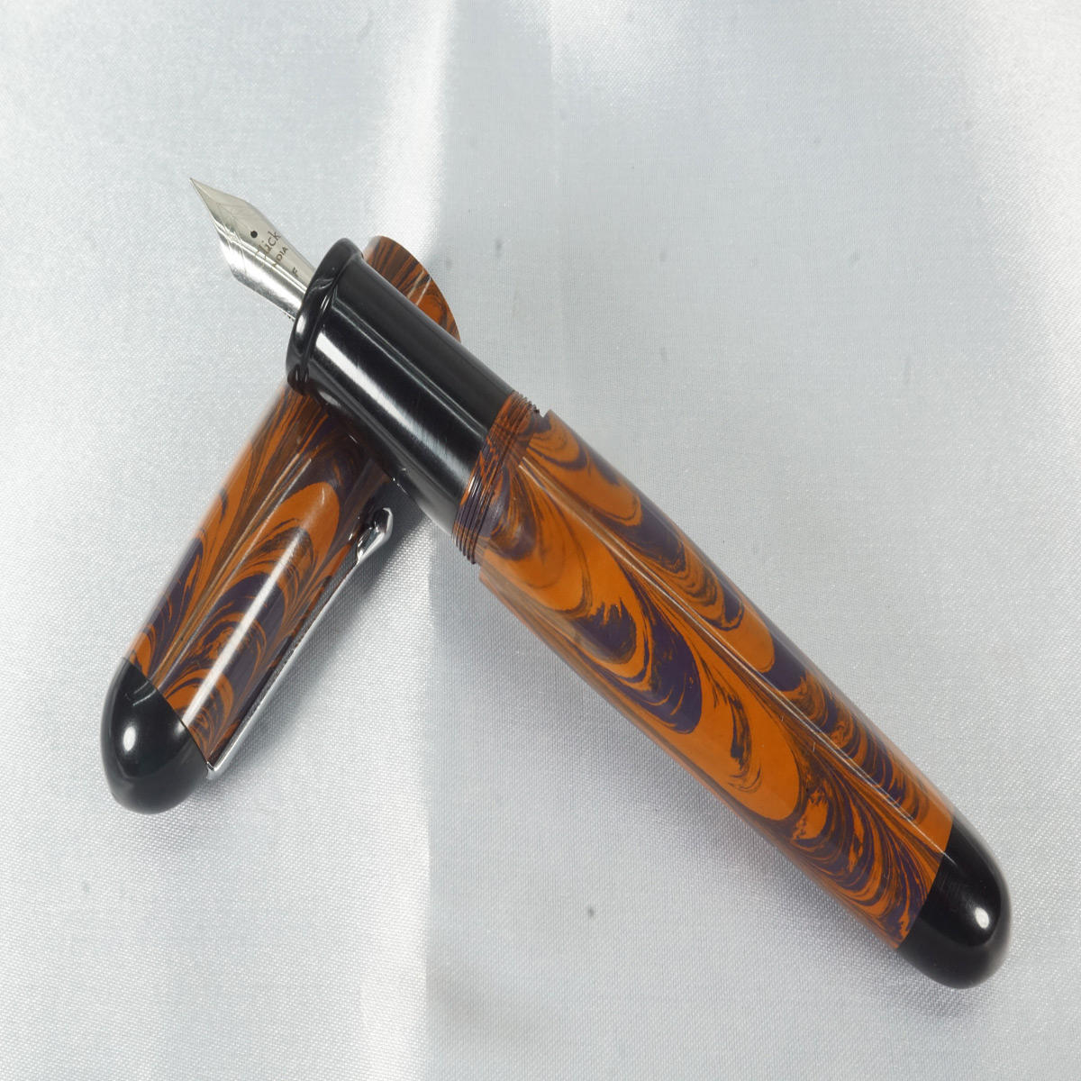 WOW Brand Model 1005B Varuna (வருணா) Classic Ebonite Orange with Blue Cap and Body Black Grip with Silver Clip Click Fine Nib Eyedropper Plus Cartridge And Converter Fountain Pen SKU 60094