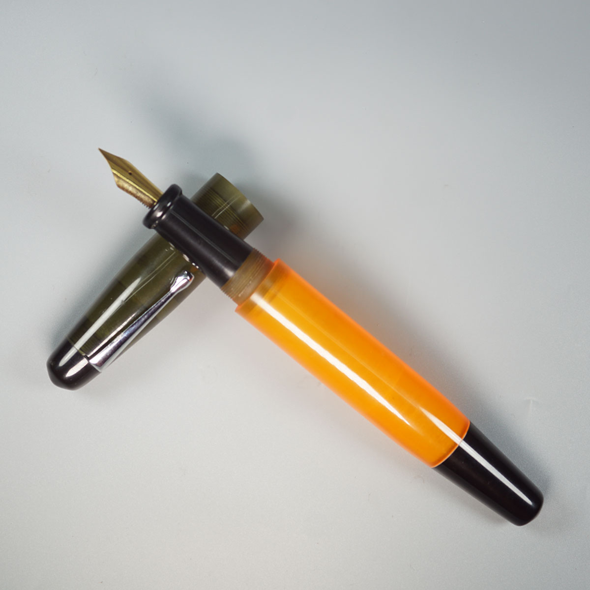 WOW Brand Model-1013A Sabyasachi Celestine சப்யசாச்சி செலஸ்டின் 20/20mm Handmade Acrylic Light Orange Color Body with Black Color Cap  Black  Ebonite Grip Silver Clip Eyedropper Plus Cartridge And Converter Fountain Pen with Jowo Fine Nib Thread SKU 60110