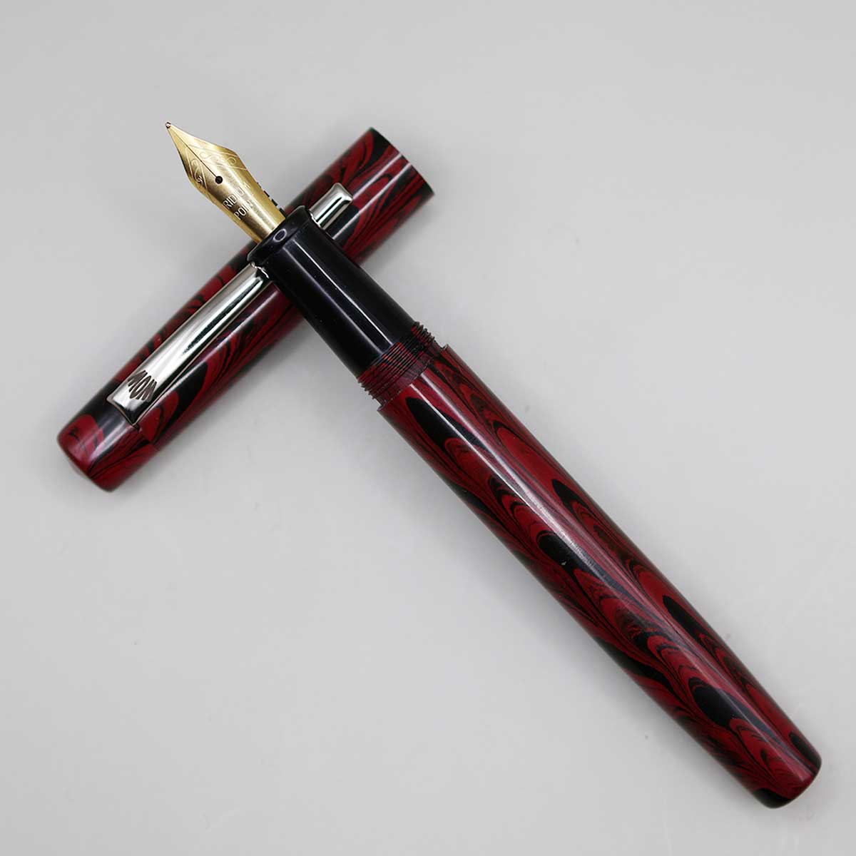 WOW Brand Model-1033A Nayam நயம் Handmade Ebonite Red and Black marble finish Color Body and Cap No.5.5 Fine Tipped Fountain Pen SKU 60117