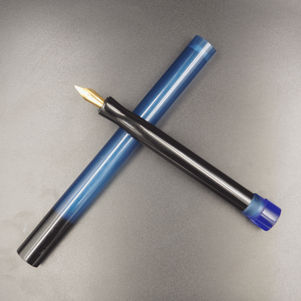 WOW Brand Model - 1028A Subhechha சுபேச்சா 18/15mm Ebonite Black Color Body And  Resin Blue Color  Long Cap with Eyedropper Plus Cartridge And Converter Fountain Pen with Jowo Compatible Thread SKU 60226