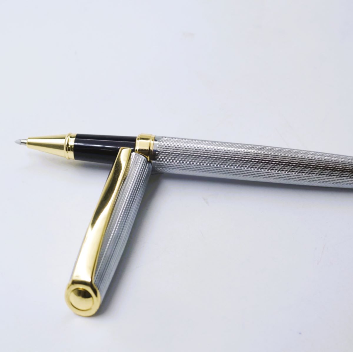 penhouse.in Glossy Silver Color Body with Gold Color Clip and trim Roller Ball pen SKU 26842