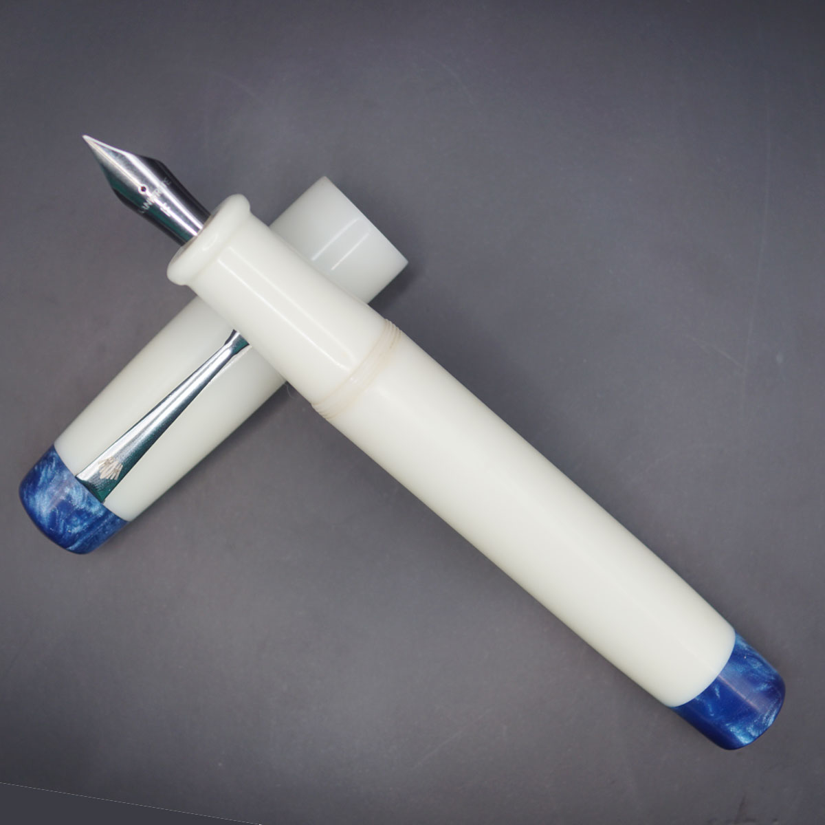 WOW Brand Model-1034A Thantham தந்தம் Handmade Resin White Color Body and Cap with Silver Clip Top and Bottom Resin Blue Color Glitter Eyedropper Plus Cartridge And Regular Converter Type Fountain Pen Kanwrite Jowo compatible Thread SKU 60159