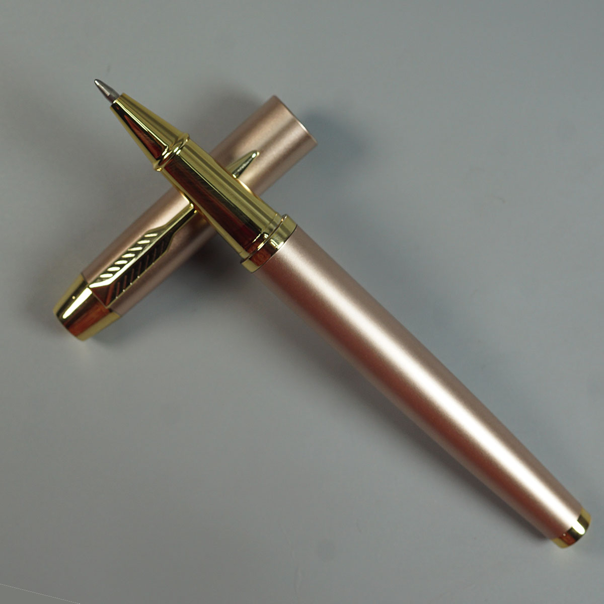 Penhouse.in pens Metallic Pink And Gold Color Body With Pink Cap And Gold Clip With Medium Tip Roller Ball Pen SKU 10857
