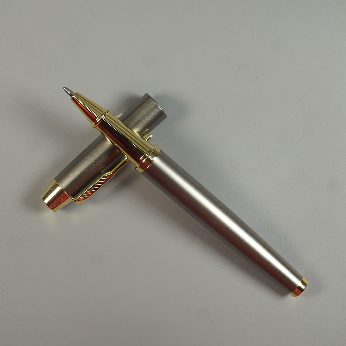 Penhouse.in pens Grey And Gold Color Body With Grey Cap And Gold Clip With Medium Tip Roller Ball Pen SKU 10858
