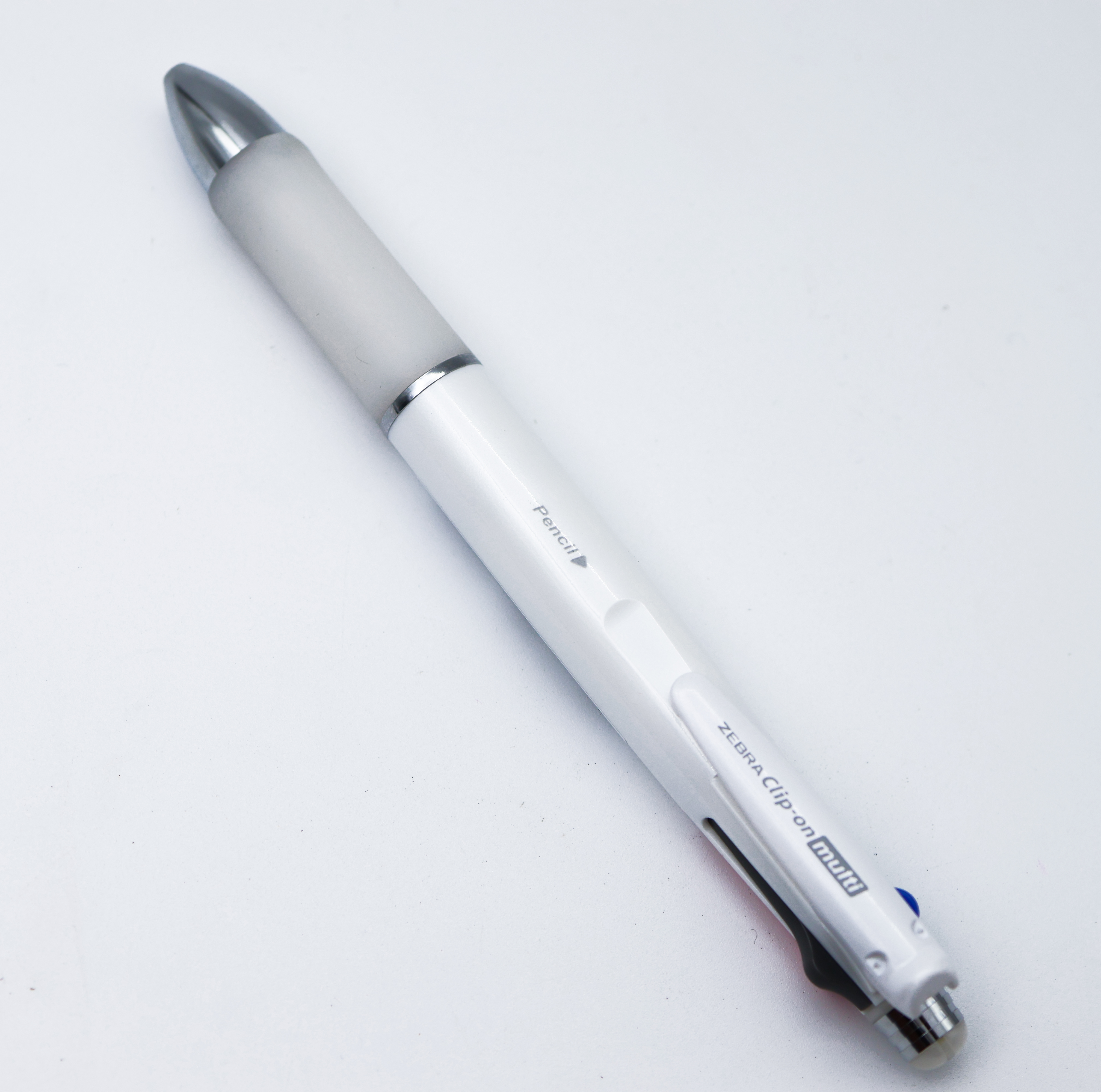 Zebra Clip-On Multi 1000S B4SA3-W  Rubber Grip White Color Body With 4 Color Writing Ball Pen  And 1  0.5 Lead Pencil SKU 24835