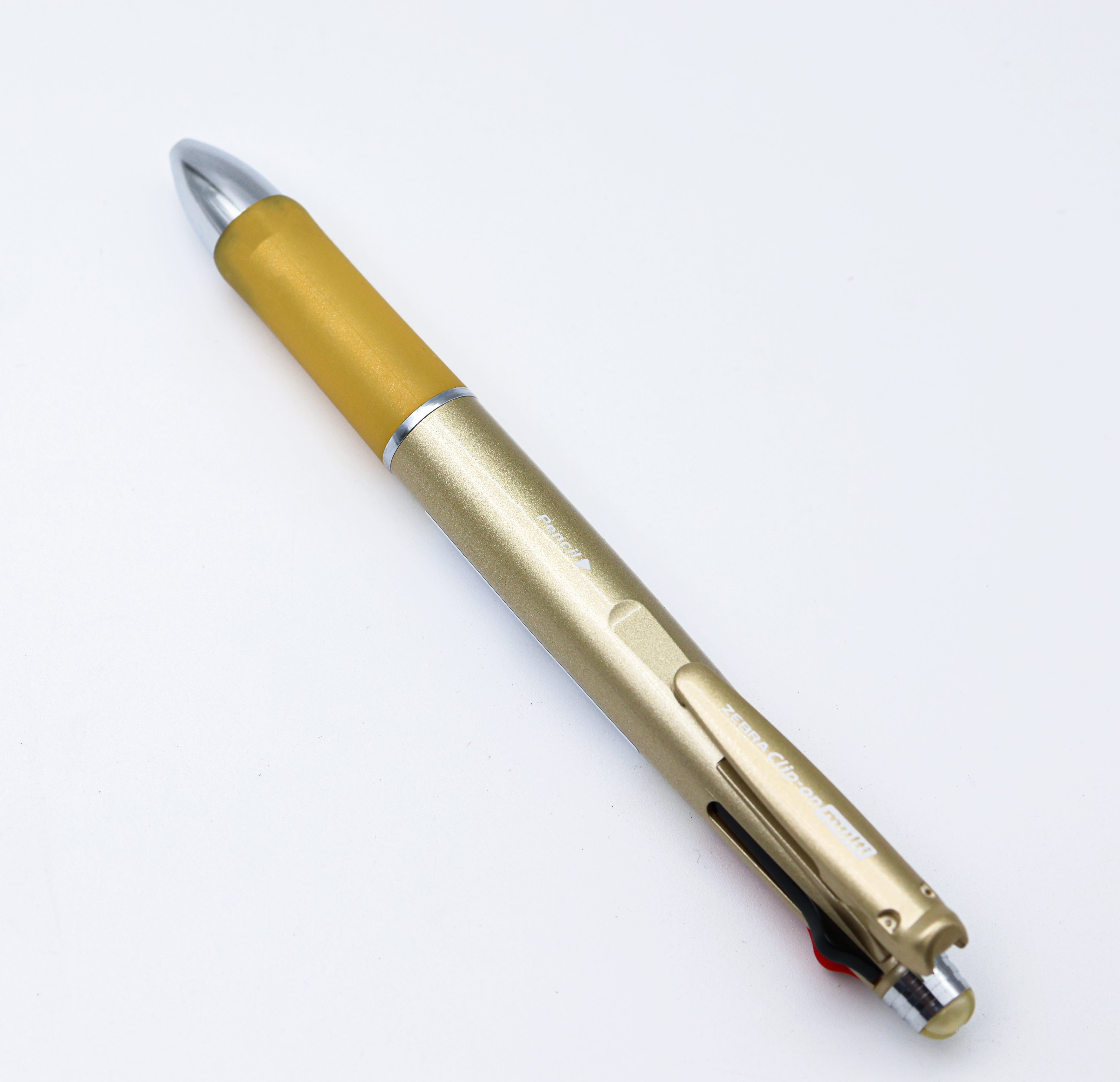 Zebra Clip-On Multi 1000S B4SA3-GO  Rubber Grip Gold Color Body With 4 Color Writing Ball Pen  And 1  0.5 Lead Pencil SKU 24833