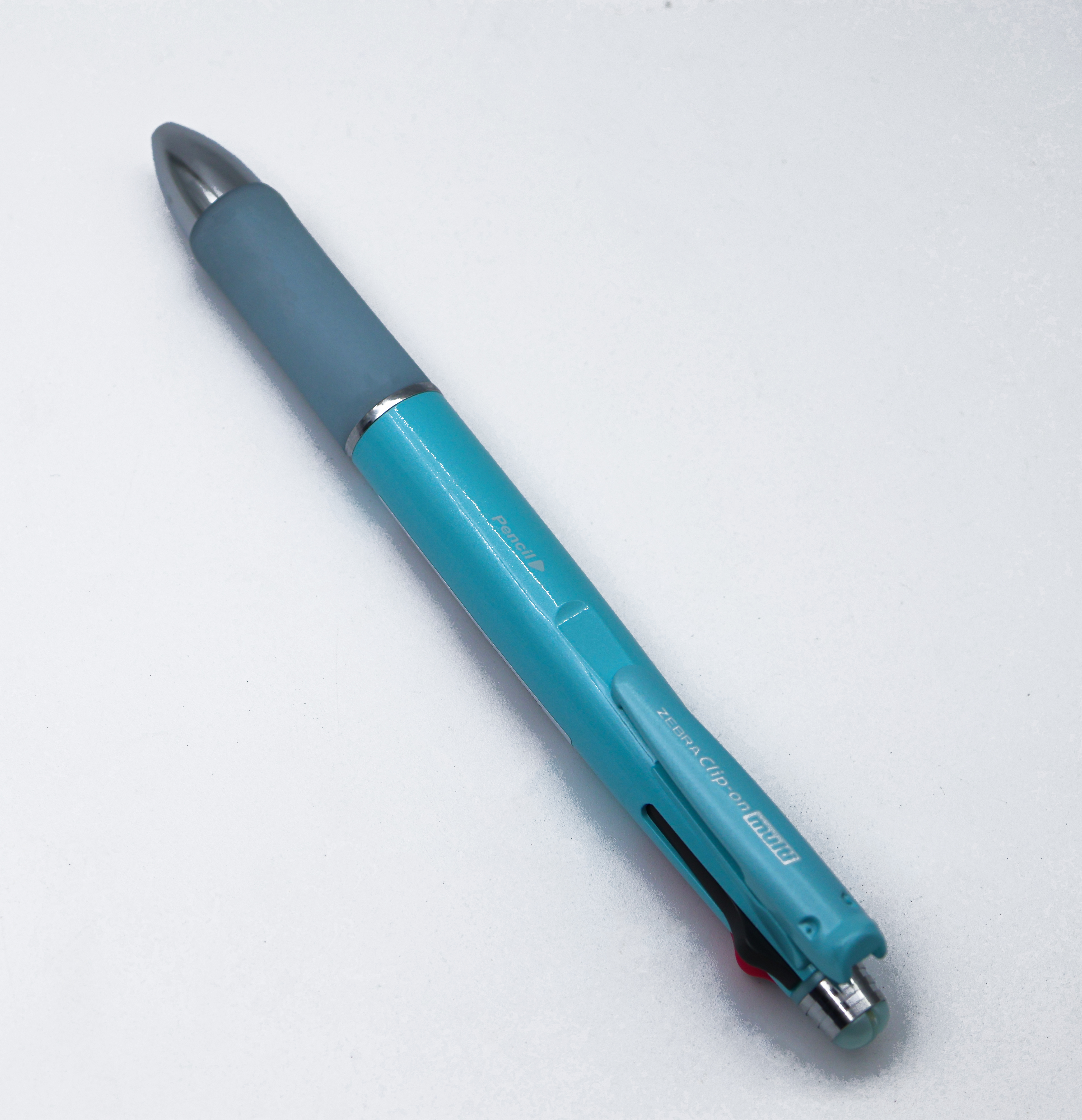 Zebra Clip-On Multi 1000S B4SA3-LB  Rubber Grip Sky Blue Color Body With 4 Color Writing Ball Pen  And 1  0.5 Lead Pencil SKU 24836