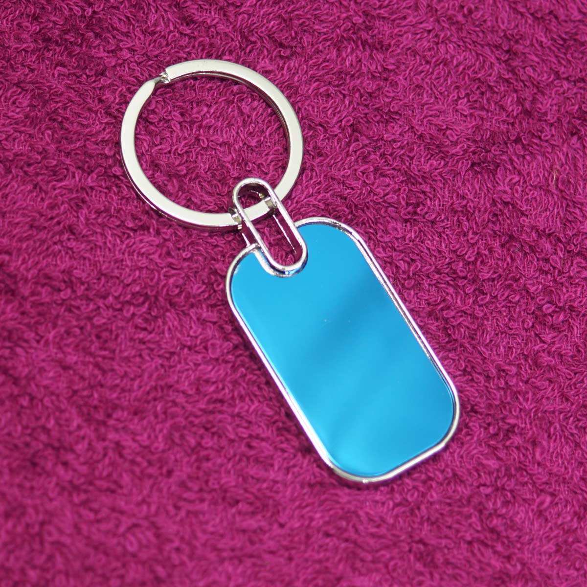 penhouse.in Metal Silver Frame With Blue Background Keychain With Customization SKU KP094