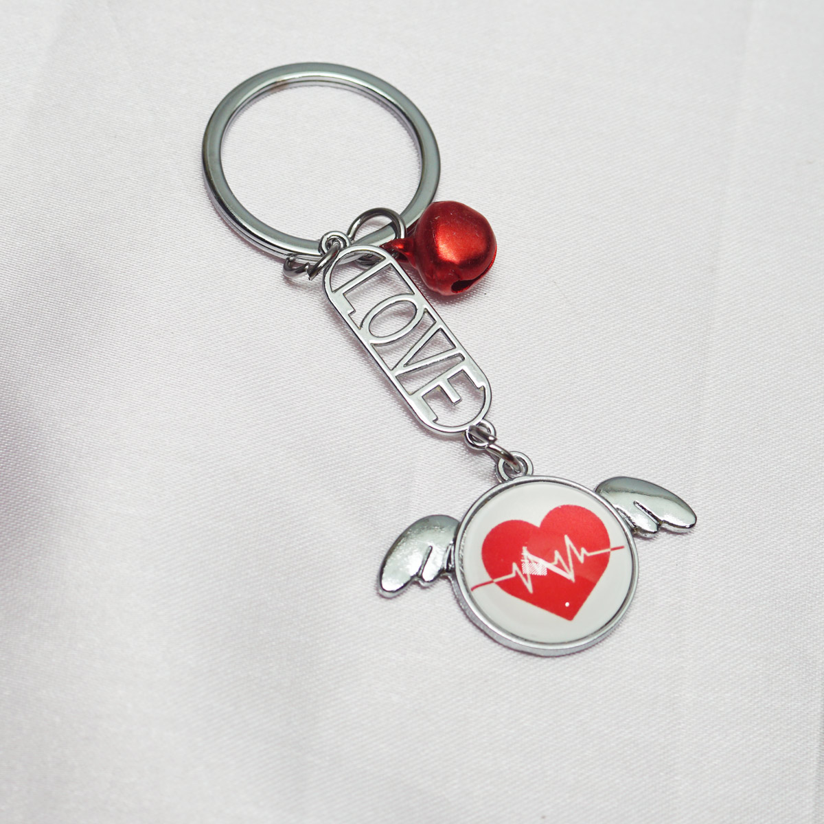 penhouse.in Flying Heart Pulse Design With Love Word And Bell Designed  Keychain SKU KP082