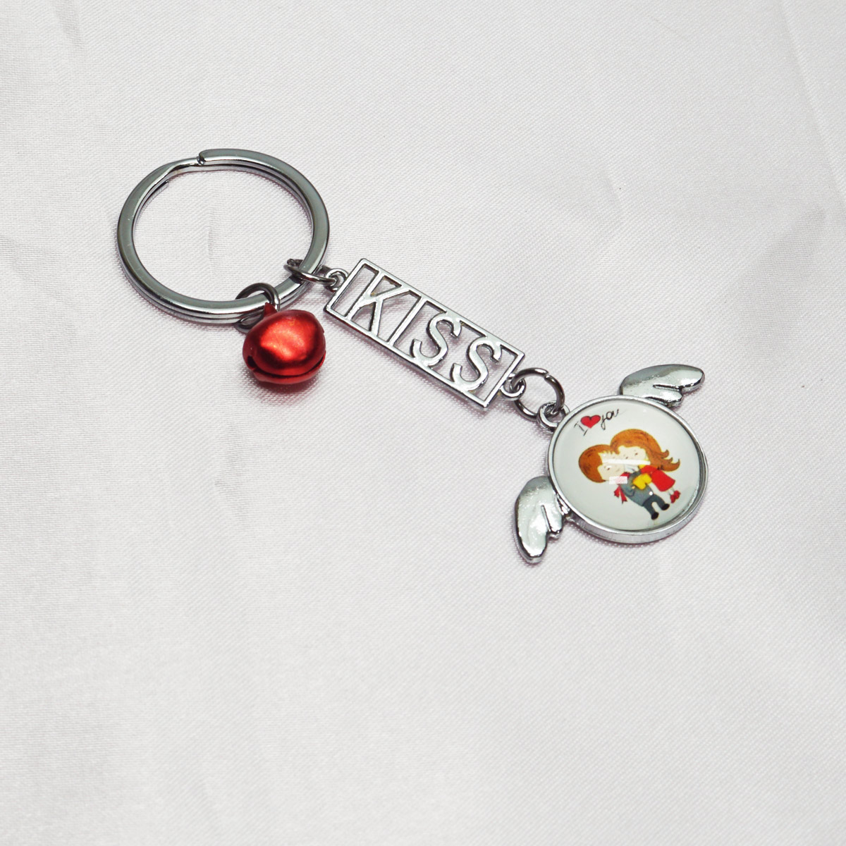 penhouse.in Flying Heart Love Design With Kiss Word And Bell Designed  Keychain SKU KP083