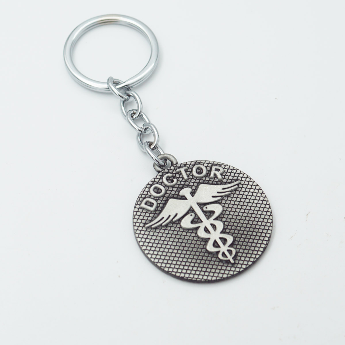 penhouse.in Gunmetal Finish Doctor Symbol Keychain SKU KP156
