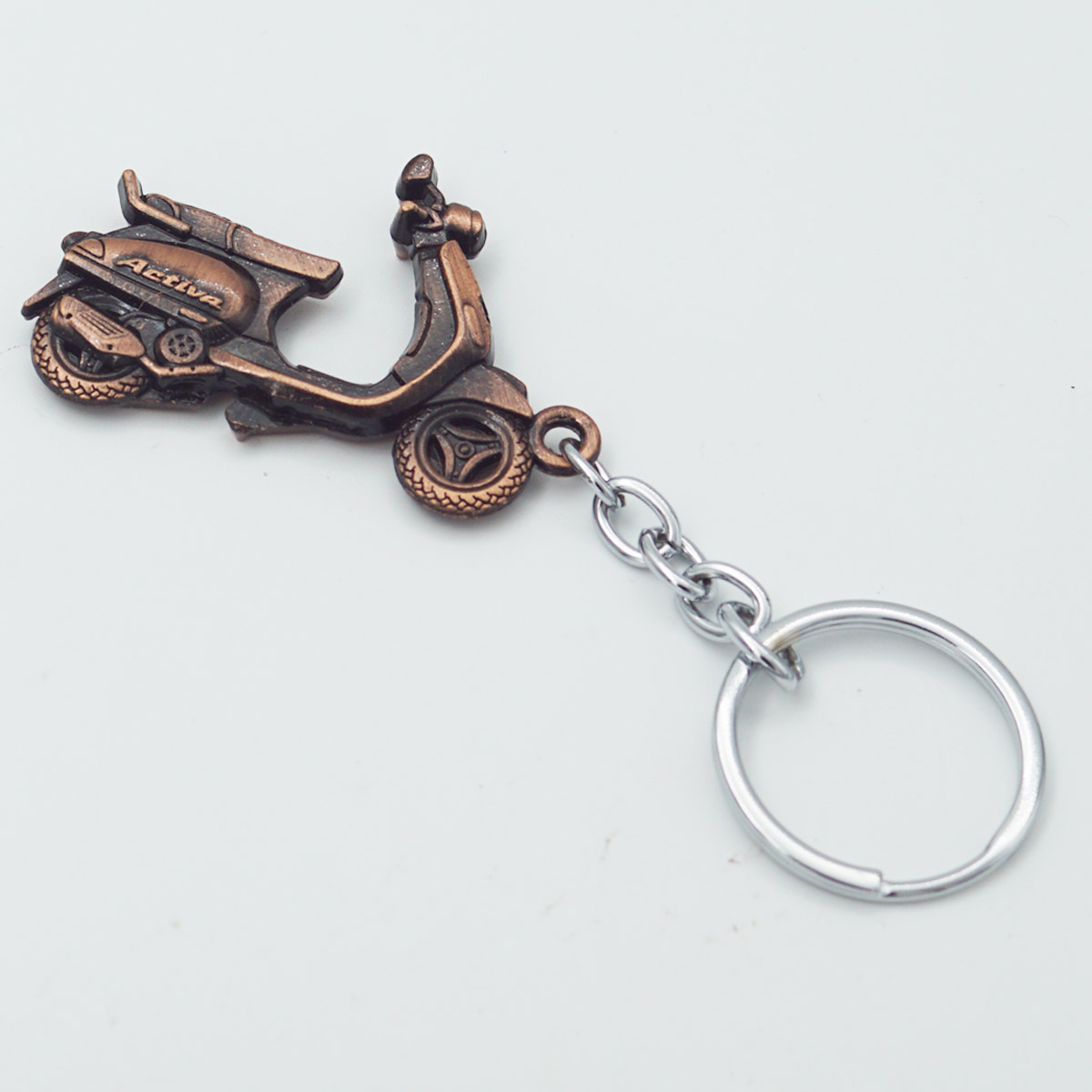 penhouse.in Copper Color Metal Activa Bike Keychian SKU KP177